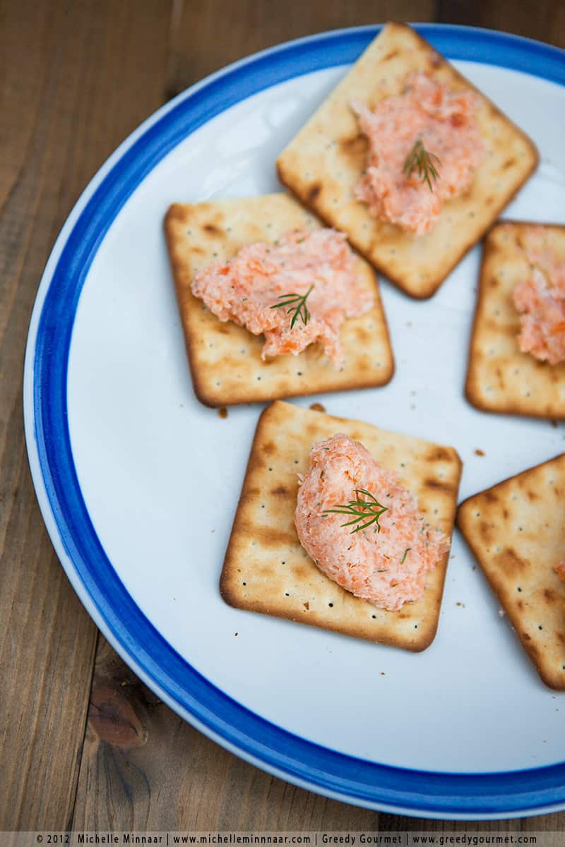 A close up of Smoked Salmon Pâté on crackers 