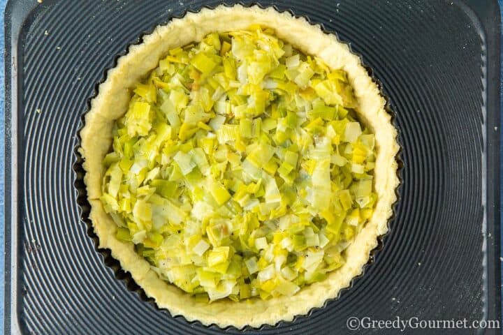 Buttery leek filling added into the pastry.