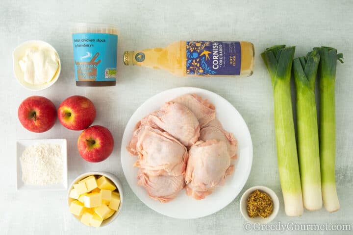 Ingredients for Normandy Chicken laid on a table.