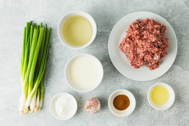 Ingredients for lamb meatballs on a table.