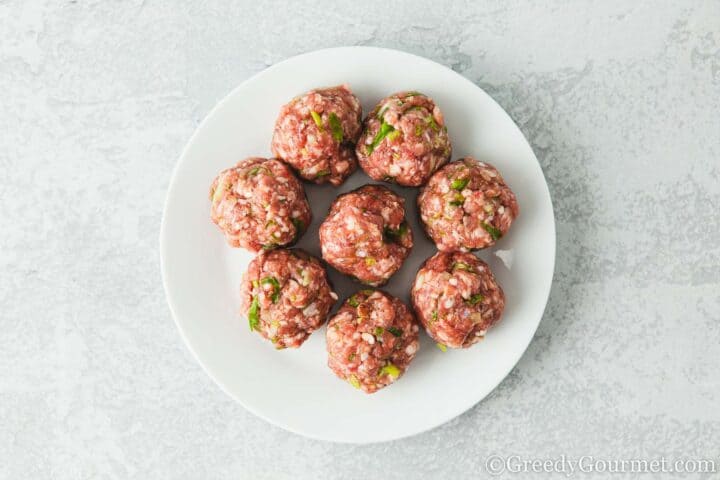 Raw lamb meatballs.