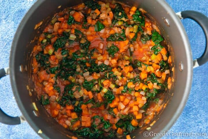 cooked chopped vegetables in a pot