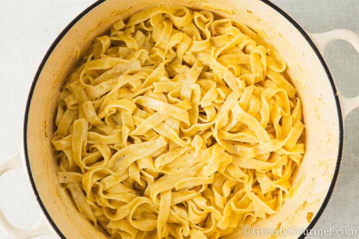 carbonara sauce mixed in pasta.