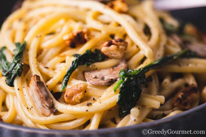 Blue Cheese Pasta served in a black bowl.