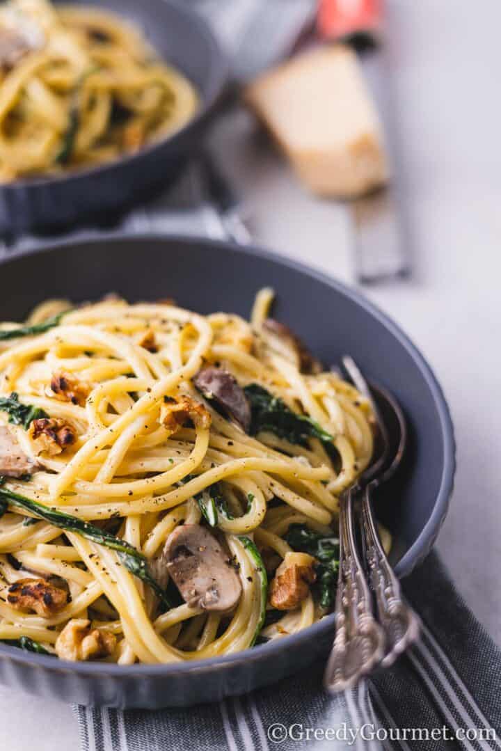 Blue Cheese Pasta served in a black bowl.