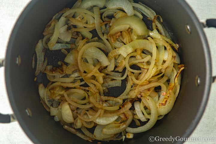 fried onions in a pot.