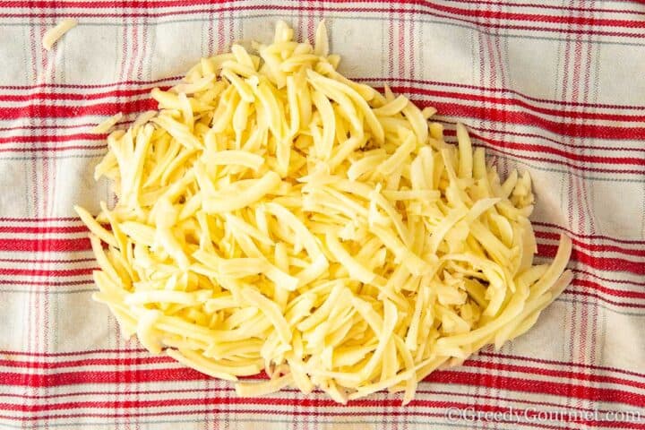 drying grated potato in a cloth.