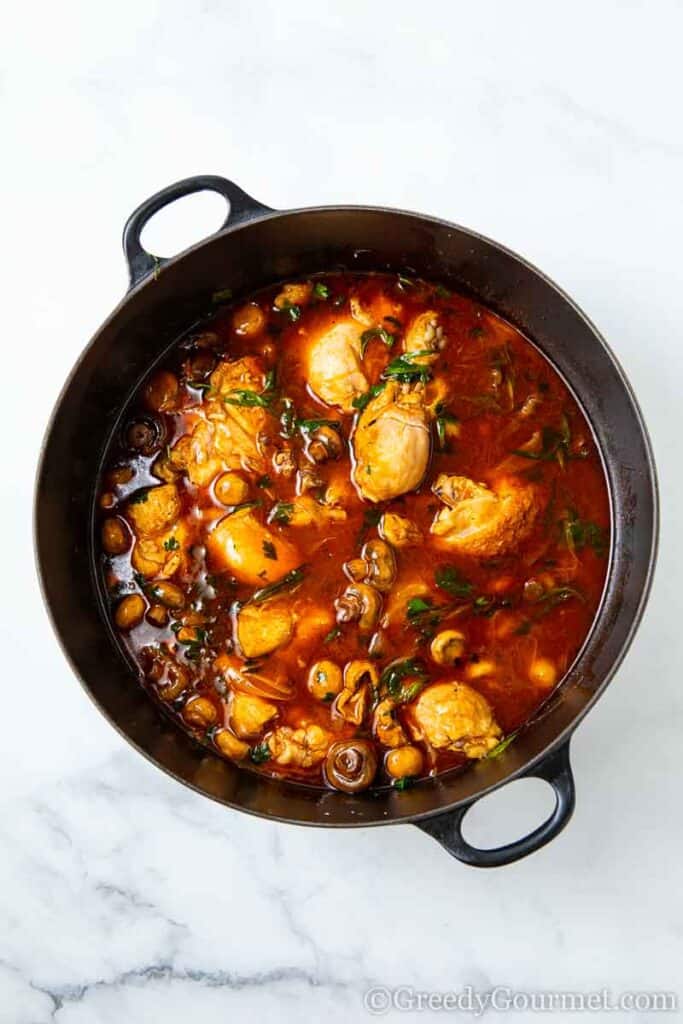 Chicken cooking in a saucepan