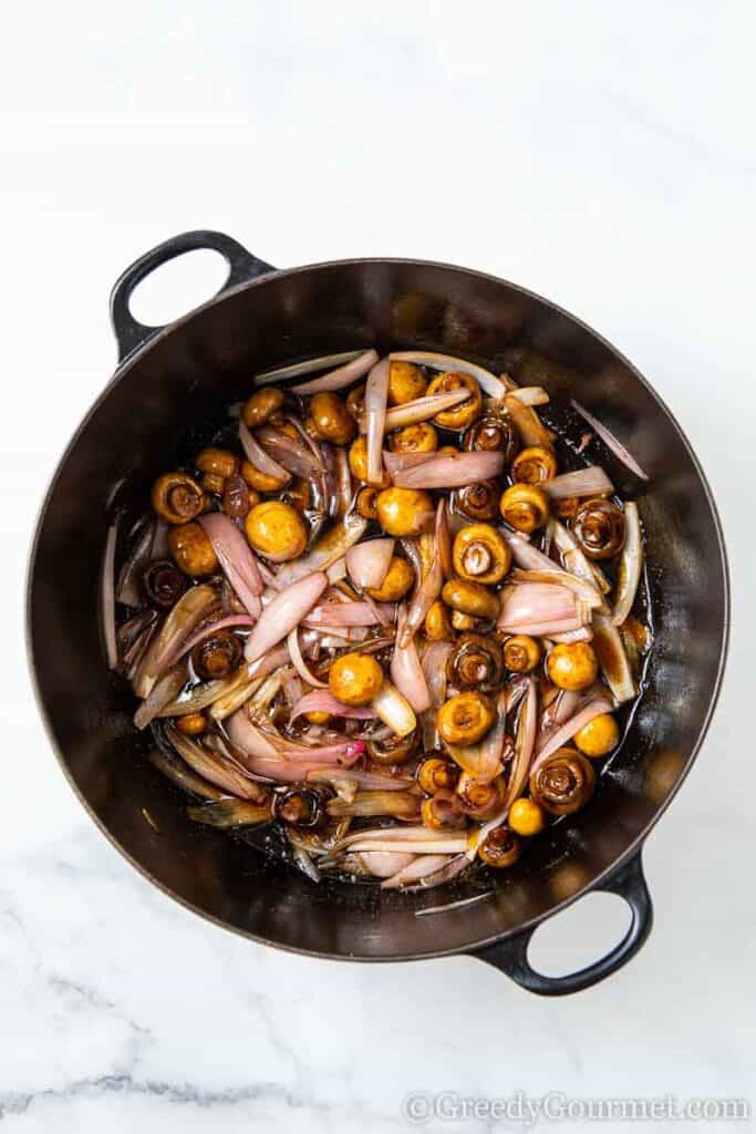 Vegetables stewing to make a slow cooked chicken recipe 