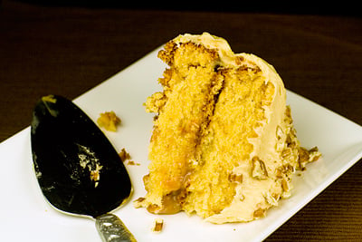 Caramel Coconut Cake with Caramel Butter Frosting & Pecans