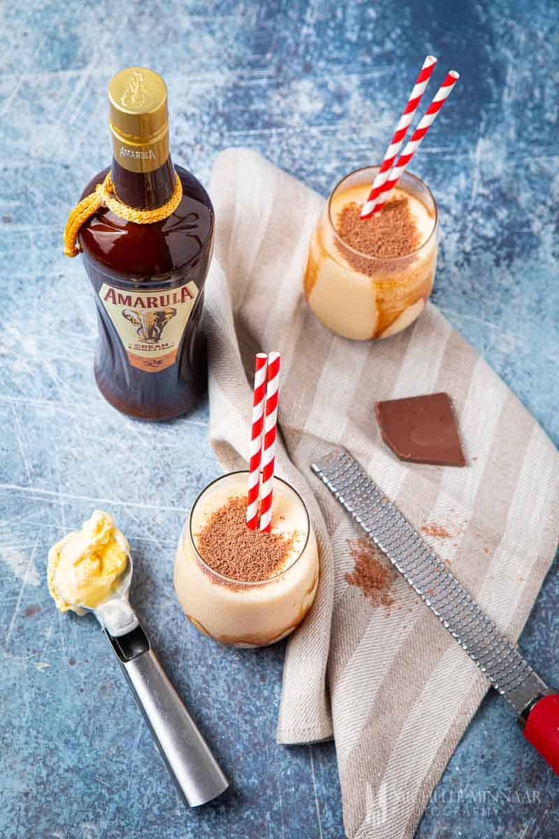 A complete don pedro recipe, one bottle of Amarula, and two don pedro drinks 