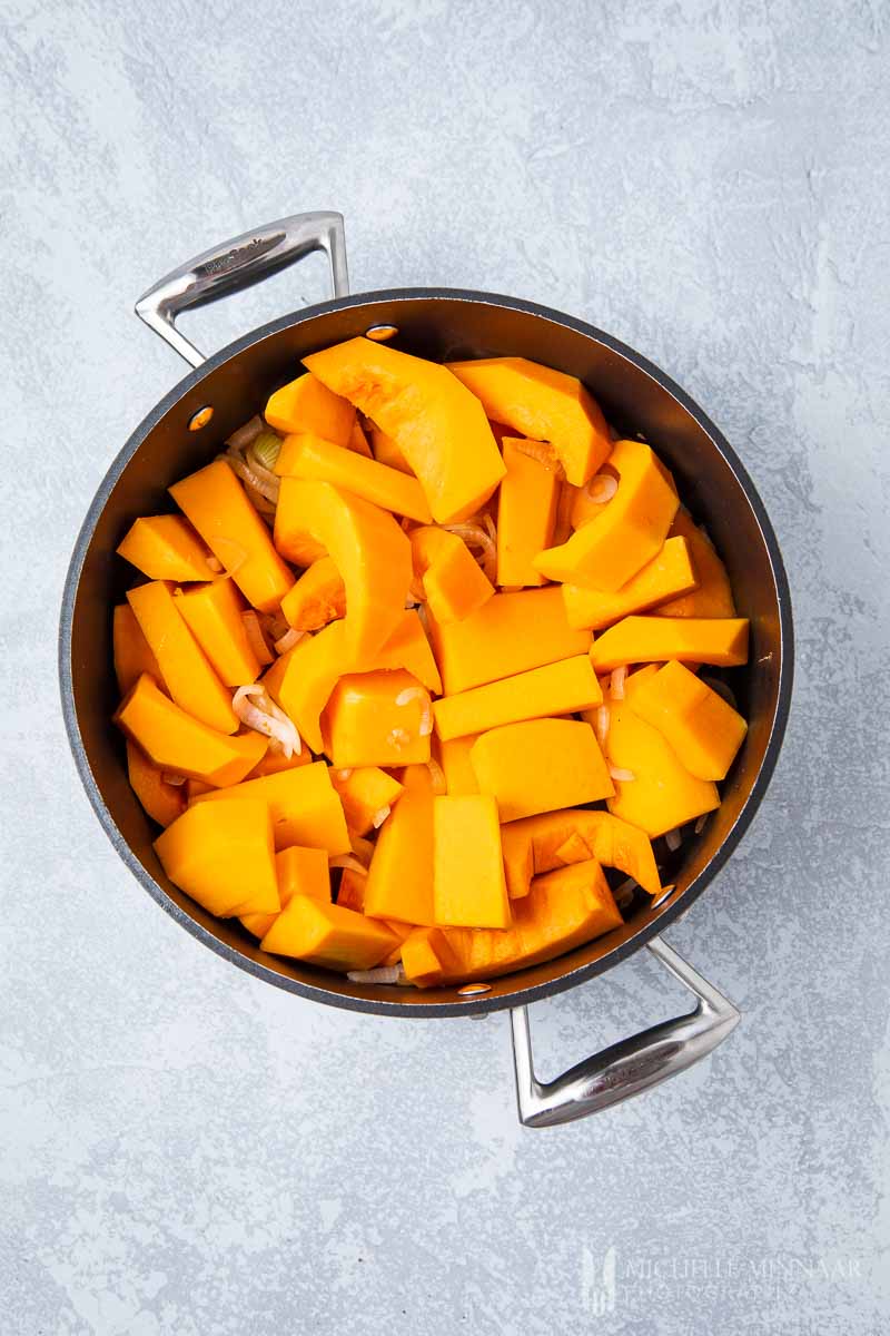 Cubed Butternut in a stock pot 