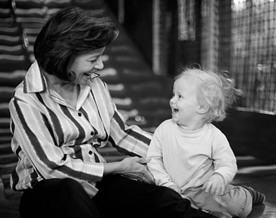 Gabriels goes down the slide with his grandmother Susan