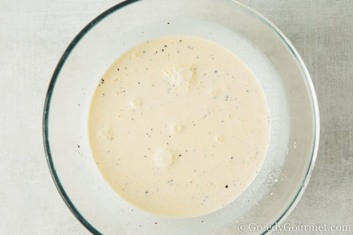bowl of cream with seasoning.