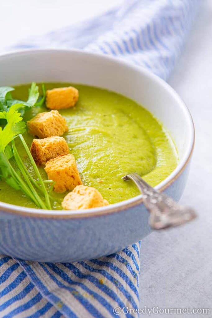 Bowl of green vegan soup 