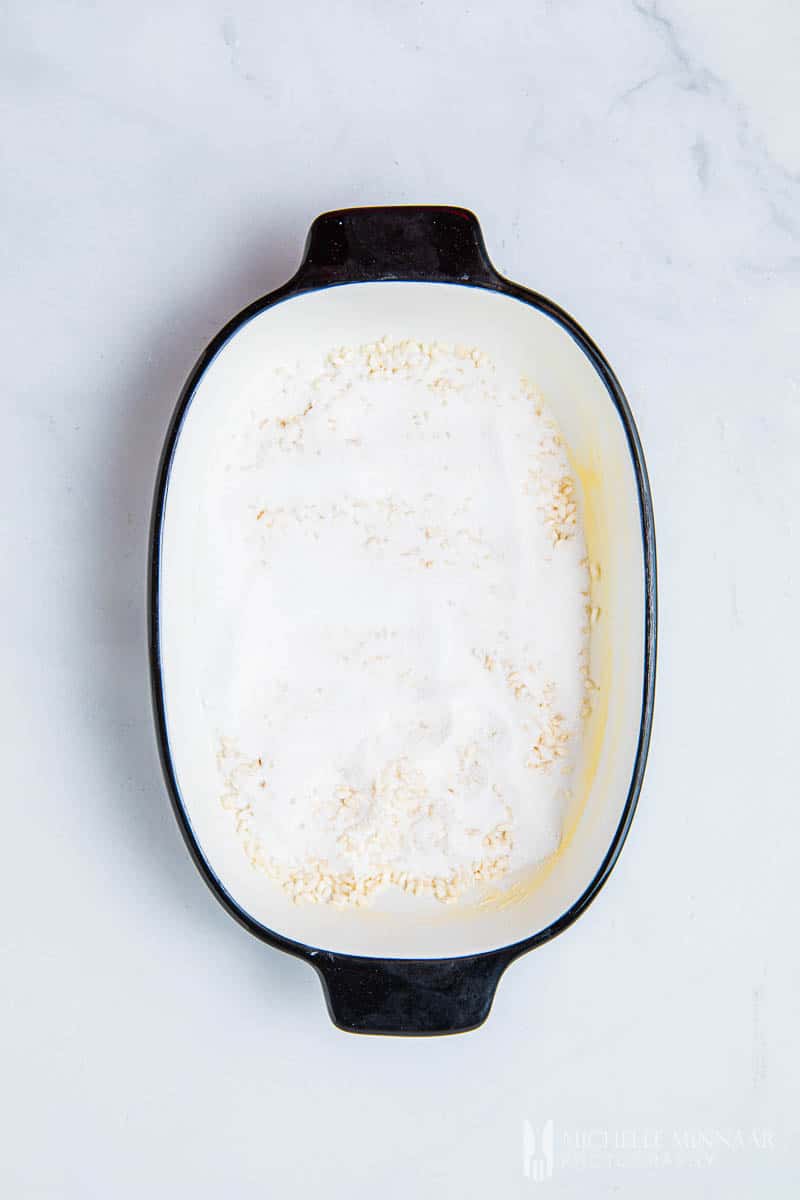 White rice pudding in stock pot 