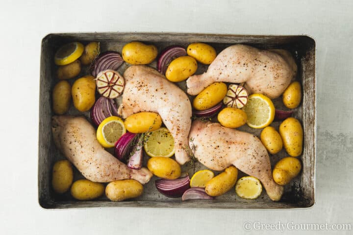 baked chicken in a large cooking tray.