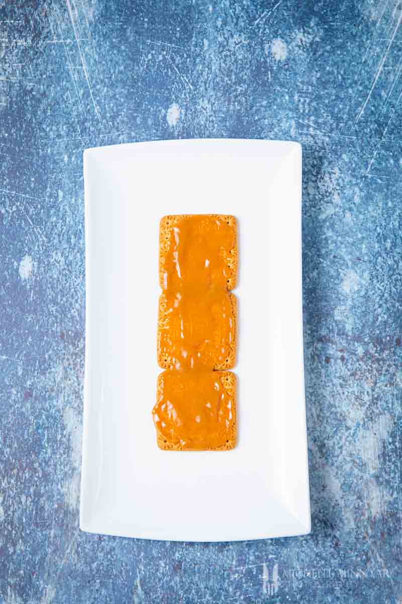 Orange jelly spread on biscuits 