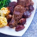 Full plate of lamb leg steak and sides