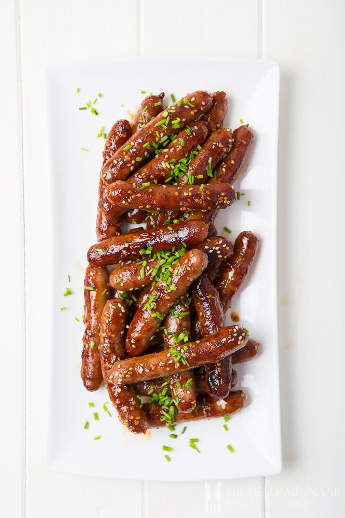 Barbecued honey and soy sausages