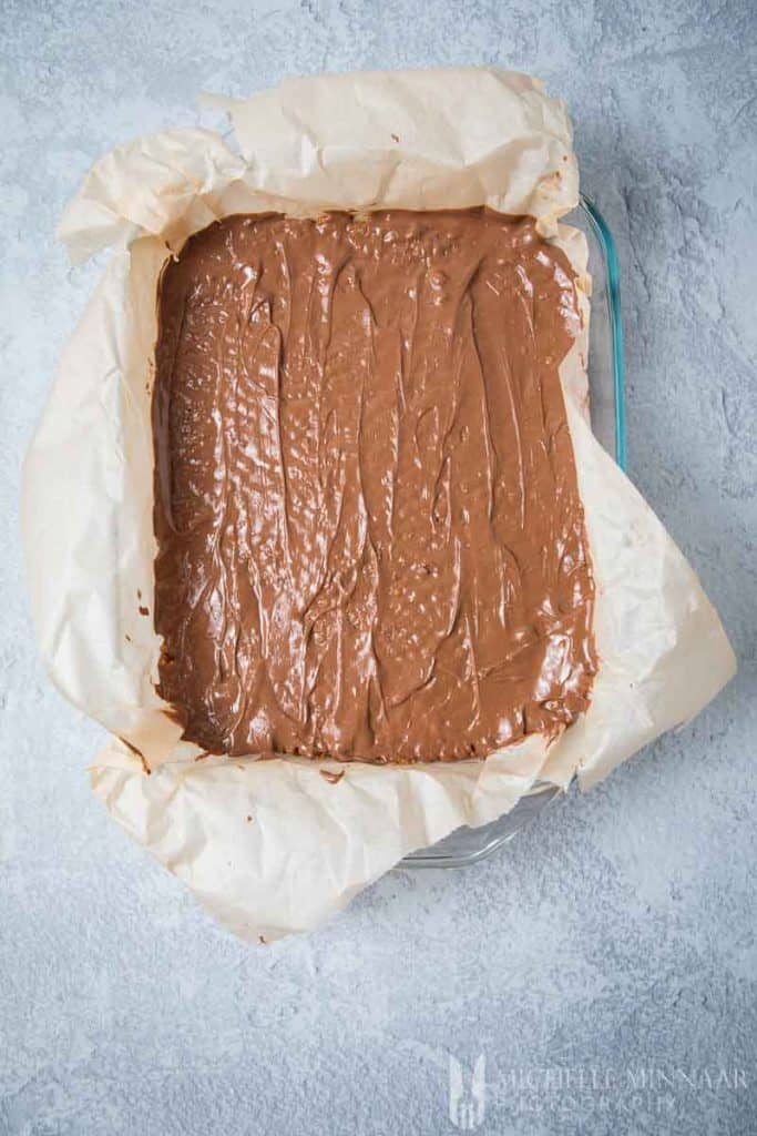 A creamy chocolate Layer in a baking pan 