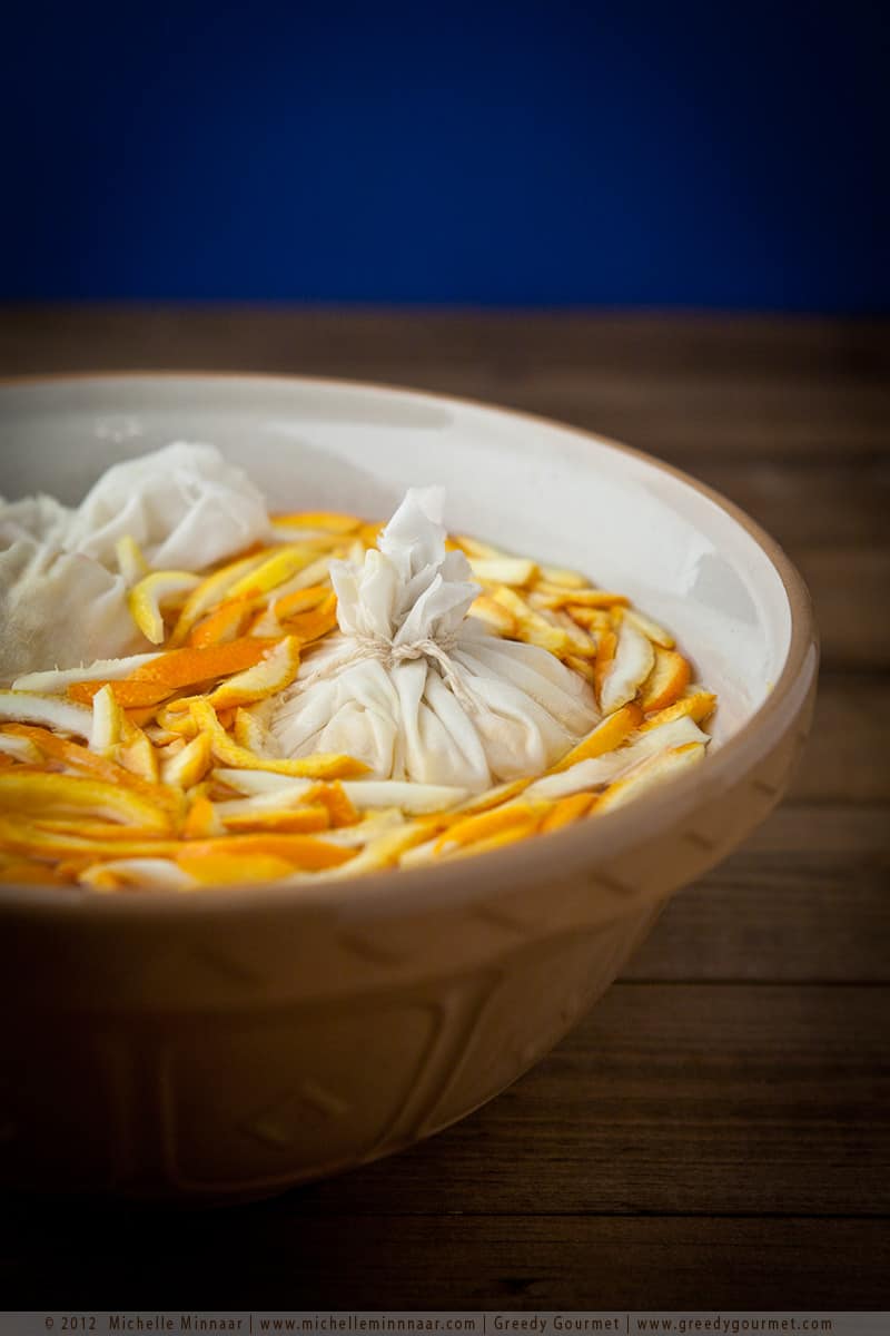 Muslin bag placed in marmalade mix