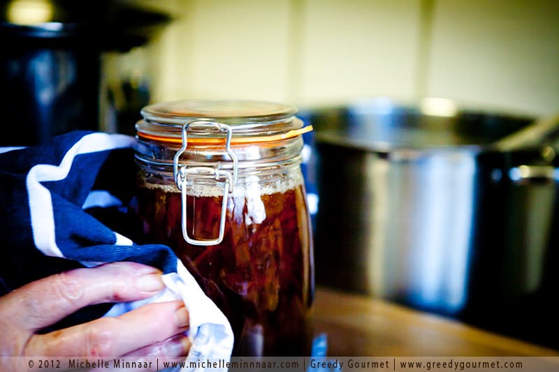 Giving marmalade jars a wipe