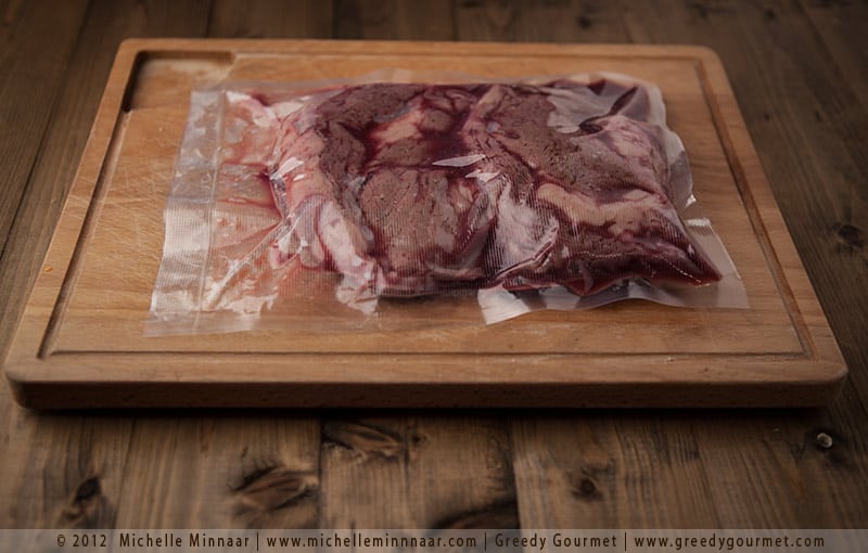 Cooked steak in vacuum sealed pouch Cooked steak in vacuum sealed pouch