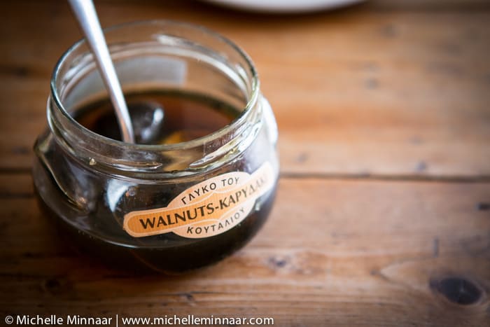 Jar of preserved walnuts.