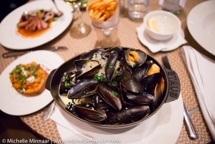 A big pot of black mussels.