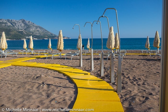 Showers and umbrellas at the beach