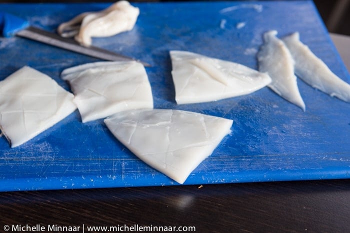 Sliced raw squid pieces