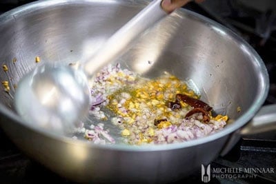 Onions sauteed in a pan