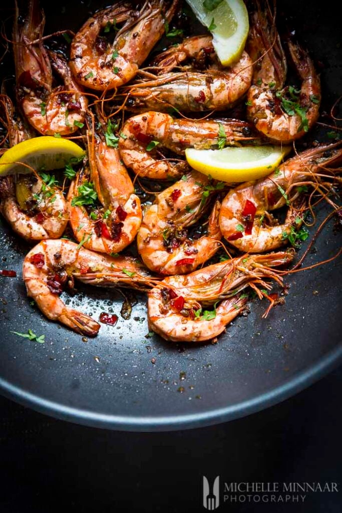 Cooked prawns and lemon