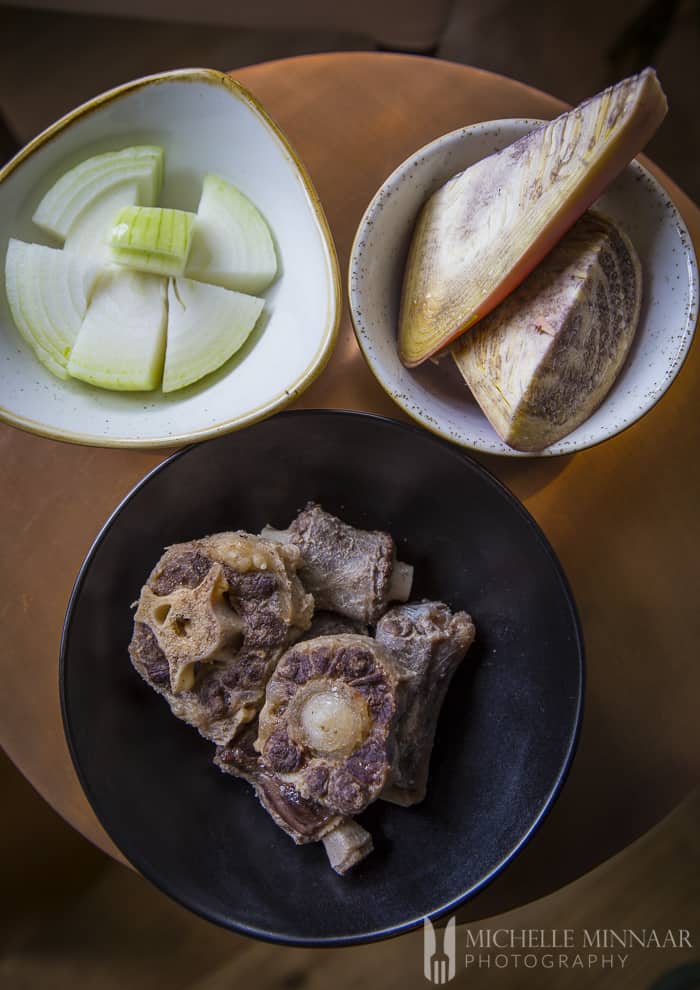 Onions, Palm Heart, oxtail in bowls