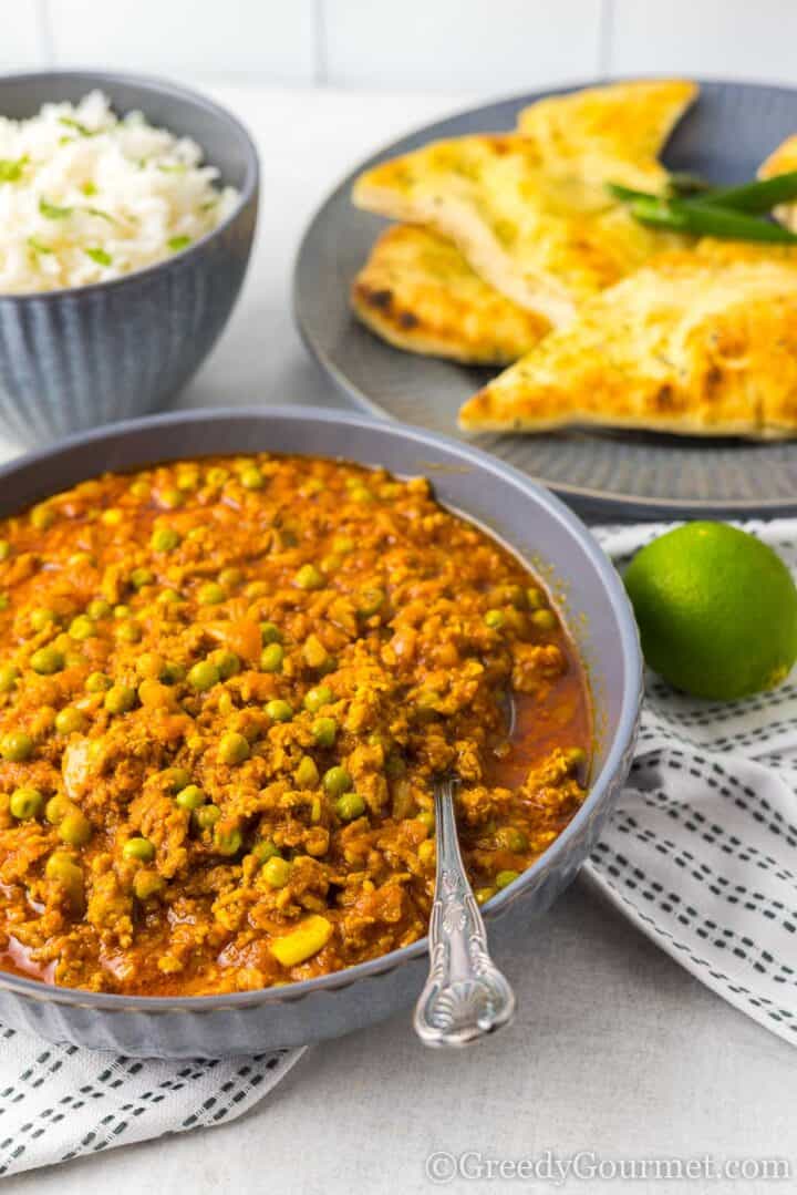 lamb keema curry with rice and naan.