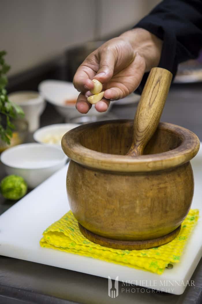 Add garlic to bowl