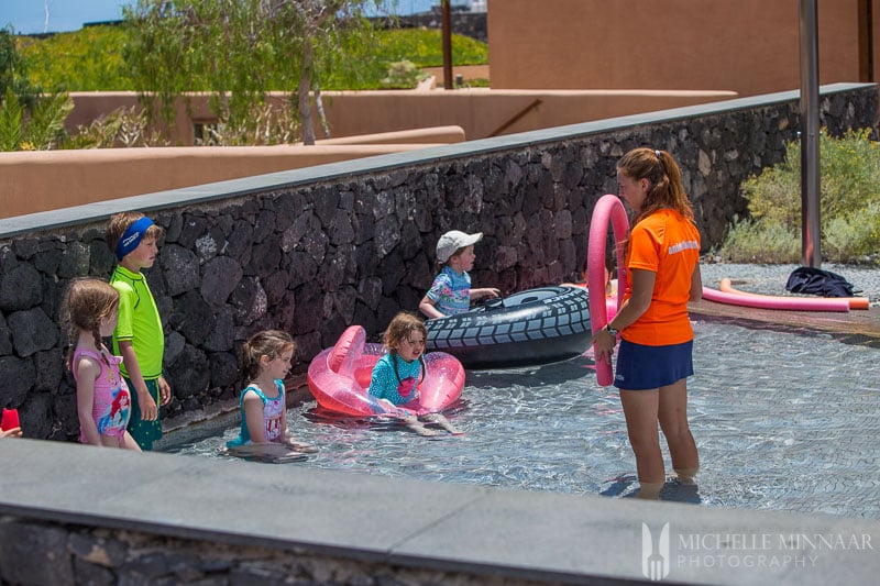 Children playing swimming games