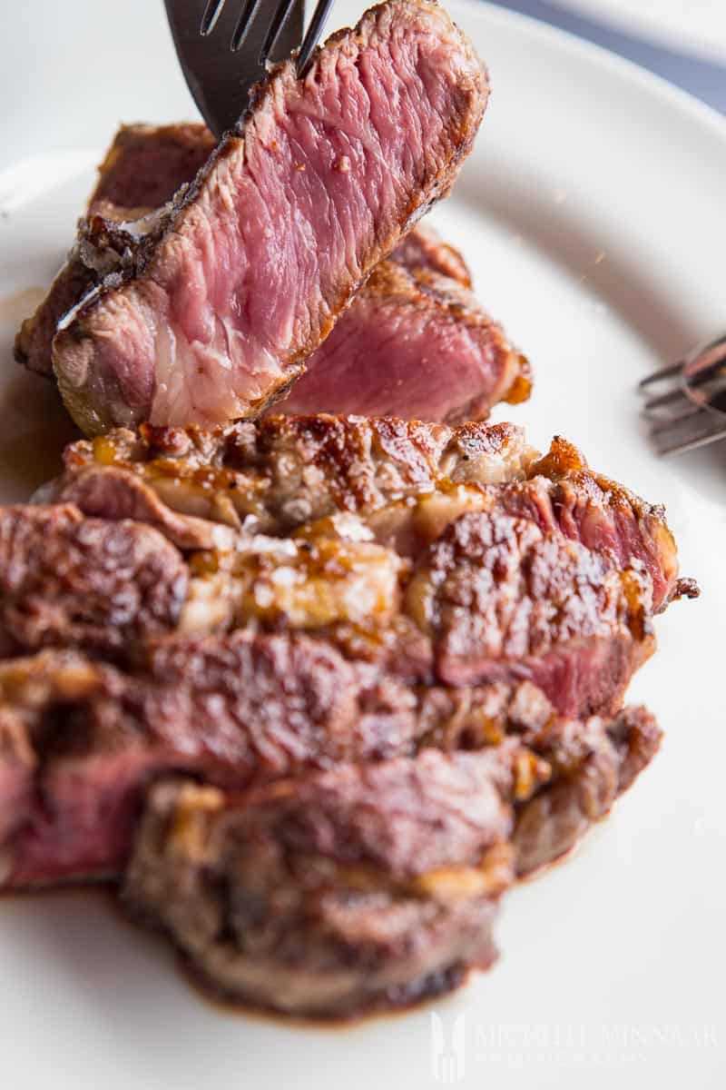 Rare cooked steak at Brunelli's Steakhouse