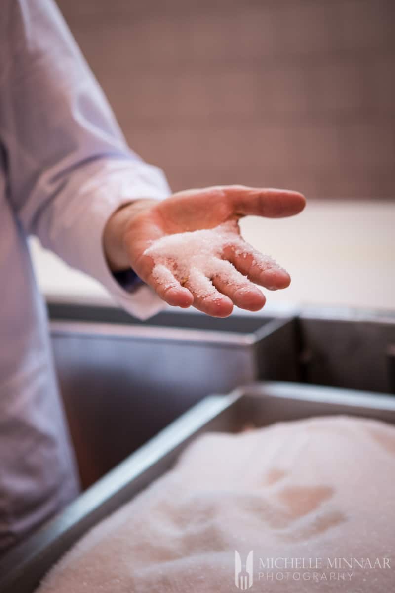 A mans hand with salt on it 