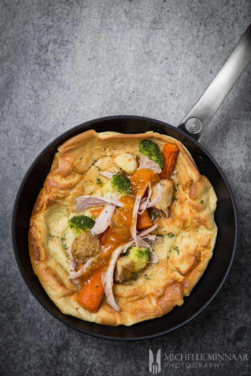 Roast Dinner Left Over Yorkshire Pudding Wrap with vegetables in a saute pan