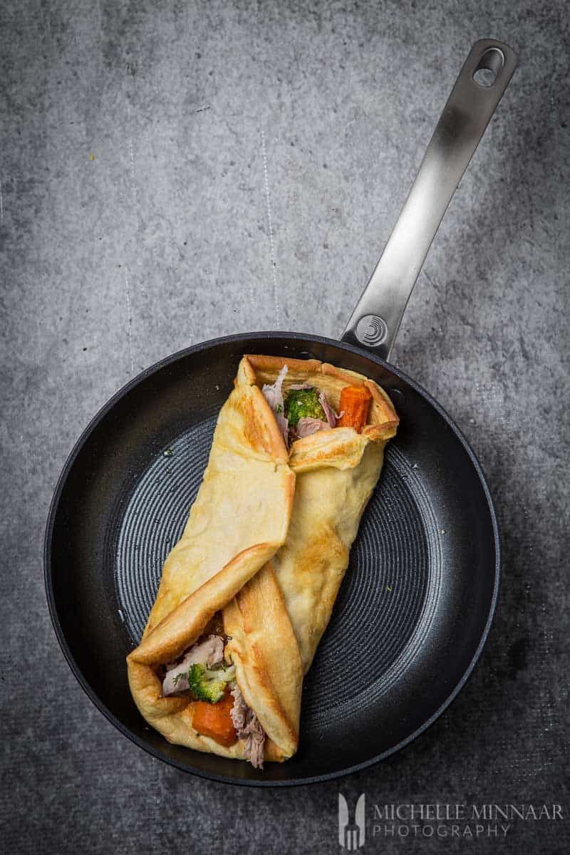 A yorkshire pudding wrap in a saute pan 
