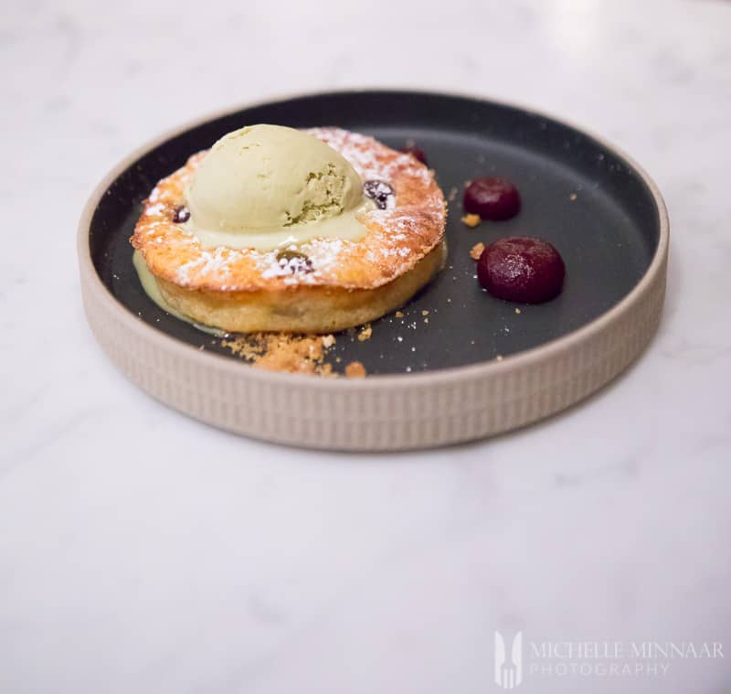 Clafoutis with Amaretto Anglaise and Pistachio Ice Cream