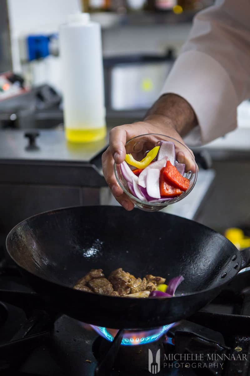 Stirfry Adding Peppers