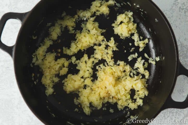 Frying onion and ginger.