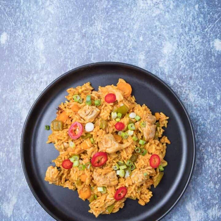 Ghanaian Jollof Rice - an aerial view of rice and chicken