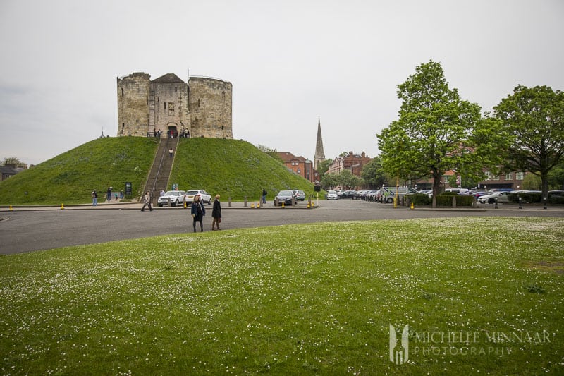 Cliffords tower and green grass