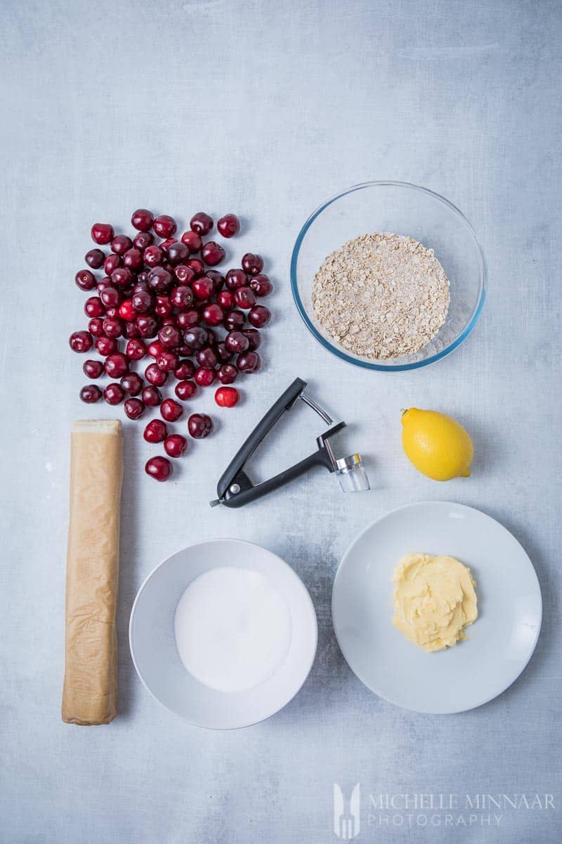 Ingredients to make cherry crumble pie : Pastry crumble butter sugar lemon