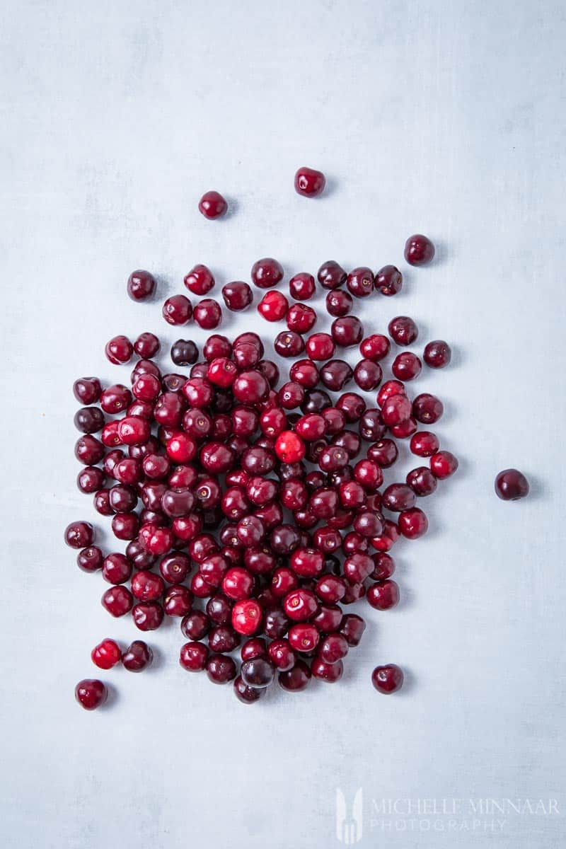 A large pile of Picota Cherries