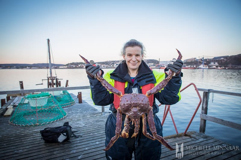 Michelle holding a King Crab 